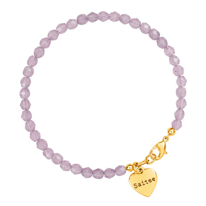 lila facet kralenarmbandje met goud slotje en hartjes bedel