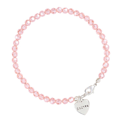 glimmend roze kralenarmbandje met hartjes bedel