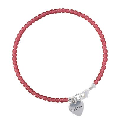 roze rood kralenarmbandje met hartjes bedel
