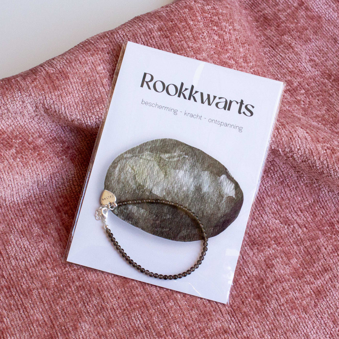 grijsbruin rookkwarts kralenarmbandje op geïllustreerde edelsteen kaart