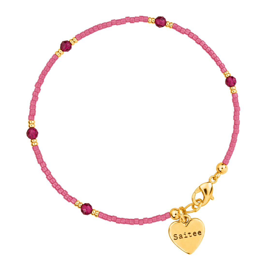 donker roze kralenarmbandje met patroon met goud slotje en hartjes bedel